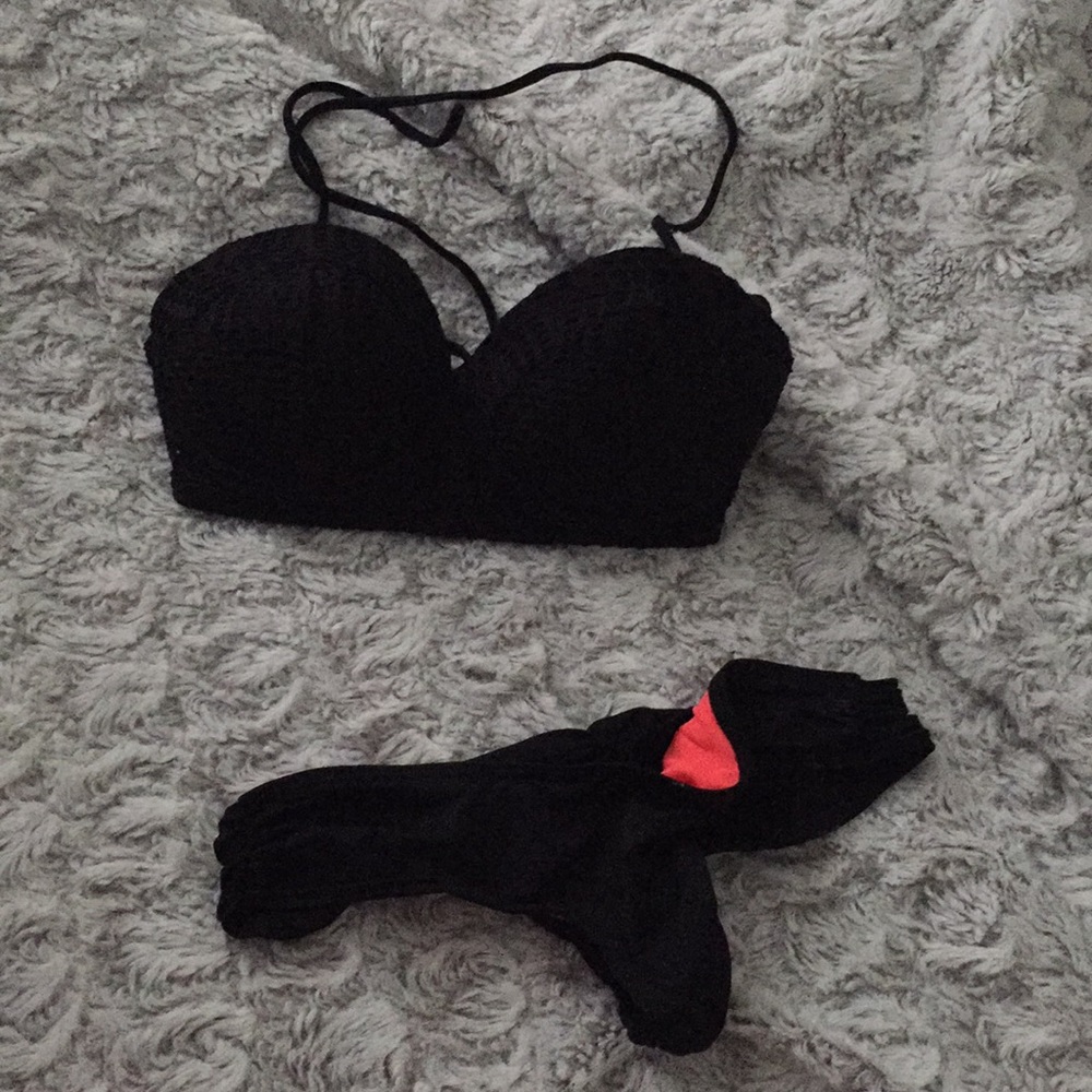 textured bikini top and black bottoms